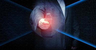 man with a metal lock stands in front of a virtual screen with a binary code. Data verification, device and network control. Data protection, search for information leakage photo