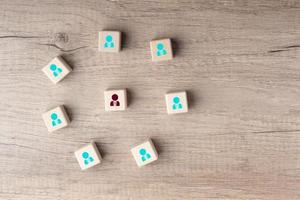 Connecting people or social media networking concept using wood square blocks on wooden background photo