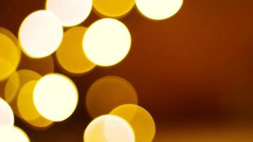 Natal abstrato dourado Castanho desfocado borrão bokeh luz fundo, 4k vídeo fundo video