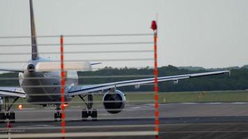 DUSSELDORF, GERMANY JULY 21, 2017 - Lufthansa Airbus A319 D AILL at start position at sunset. Dusseldorf airport, Germany video