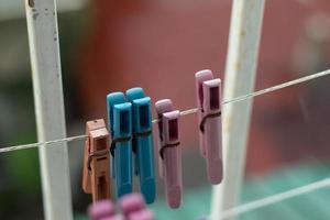 Clothespins on the balcony. Bokeh close-up, clothes dry photo