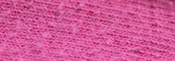 Pink fabric material tissue texture background macro photo