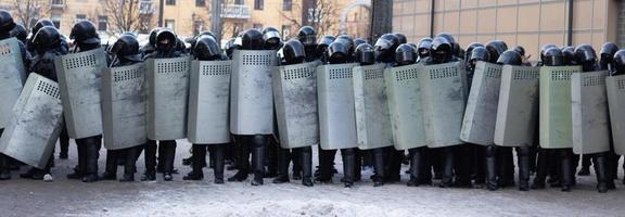 Riot police full equipment. Armor and shields. Military police uniform, police fight protest photo