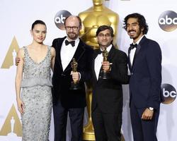 LOS ANGELES, FEB 28 - Daisy Ridley, James Gay-Rees, Asif Kapadia, Dev Patel at the 88th Annual Academy Awards, Press Room at the Dolby Theater on February 28, 2016 in Los Angeles, CA photo