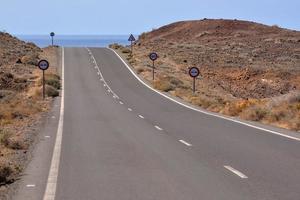 Road through the scenic landscape photo