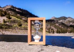 Hourglass by the lake photo