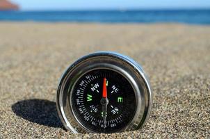 Compass in the sand photo