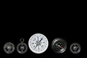 Collection of compasses photo