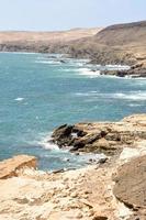 Rocky coast in summer photo