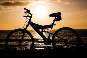Bicycle at sunset photo
