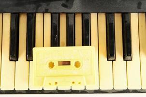 Cassette tape on piano keys photo