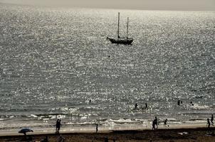 Sailing boat on the sea photo