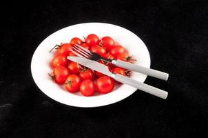 Bowl of tomatoes photo