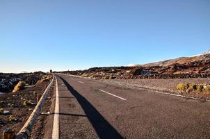 Road through the scenic landscape photo