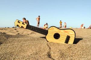 Ukelele on the sand photo