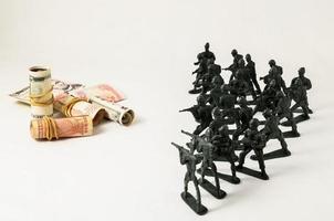 Toy soldiers and money photo