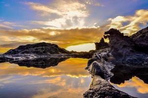 Sunset over the ocean photo