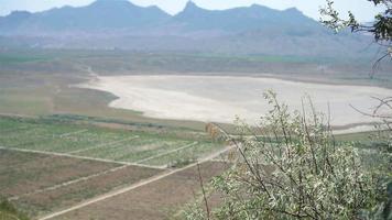 View of the white lake from the height of the mountain. video