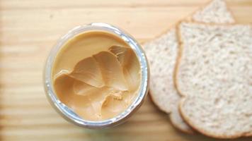 Top view of peanut butter in a container video