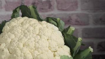 Close up of cauliflower heads on the table . video