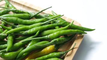 Close up of green chili on a chopping board video