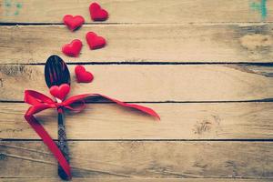 Valentines day dinner with table setting in rustic wood for Vintage style. photo