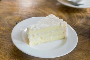 close up white cake on table photo