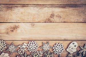 Christmas decoration with wood snowflake on table with copy space photo