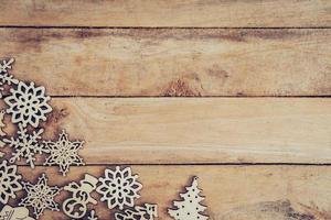 Christmas decoration with wood snowflake on table with copy space photo