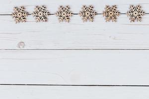 Ornaments christmas decoration wooden on wooden white  with space. Christmas background. photo