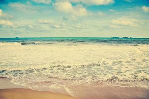 Beach sea and clouds in summer with vintage tone. photo