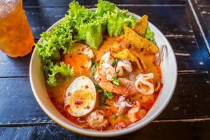 noodle tom yum and thai food with delicious photo