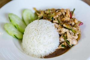 Thai food Thai spicy food, Fried chicken with sweet basil. photo