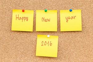 Sticky blank note new year 2016 with space for text. photo