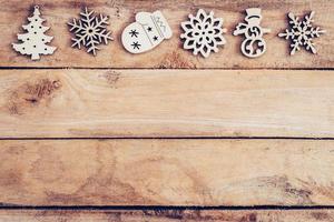 Christmas decoration with wood snowflake on table with copy space photo