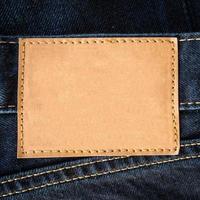 close up brown leather jeans empty with space photo