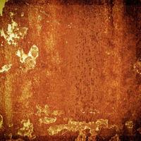 Grunge metal rust and orange texture for halloween background with space photo