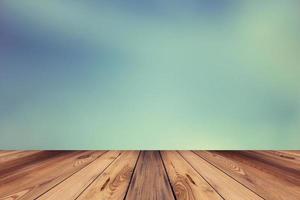Wood floor and abstract blur background with space for text photo
