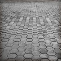 floor paving tiles or cement brick floor background photo