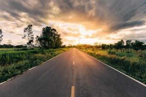 road and sunset in chiang mai, thailand. photo