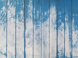 blue texture of rough wooden fence boards background photo