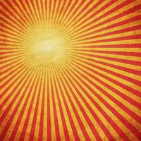 Red and Yellow grunge sunburst vintage background with space photo
