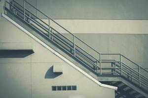 Fire escape ladder on the side of building photo