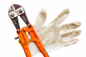 Wrench and gloves on isolated white with clipping path. photo