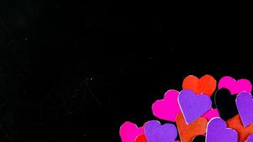 multicolored heart on black background for valentine's day photo