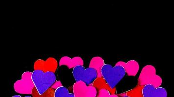 multicolored heart on black background for valentine's day photo