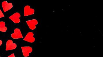 red heart on black background for valentine day photo