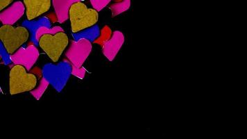 multicolored heart on black background for valentine's day photo