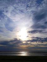 The sea at sunset. Beautiful clouds. photo