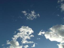 Blue sky and white fluffy clouds. photo